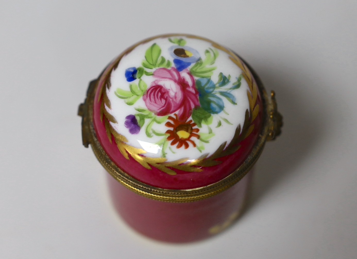A pair of 19th century glass vases and a Limoges box
